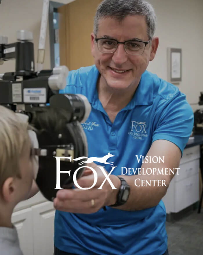 A doctor giving a kid an eye exam