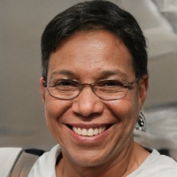 A woman wearing glasses.